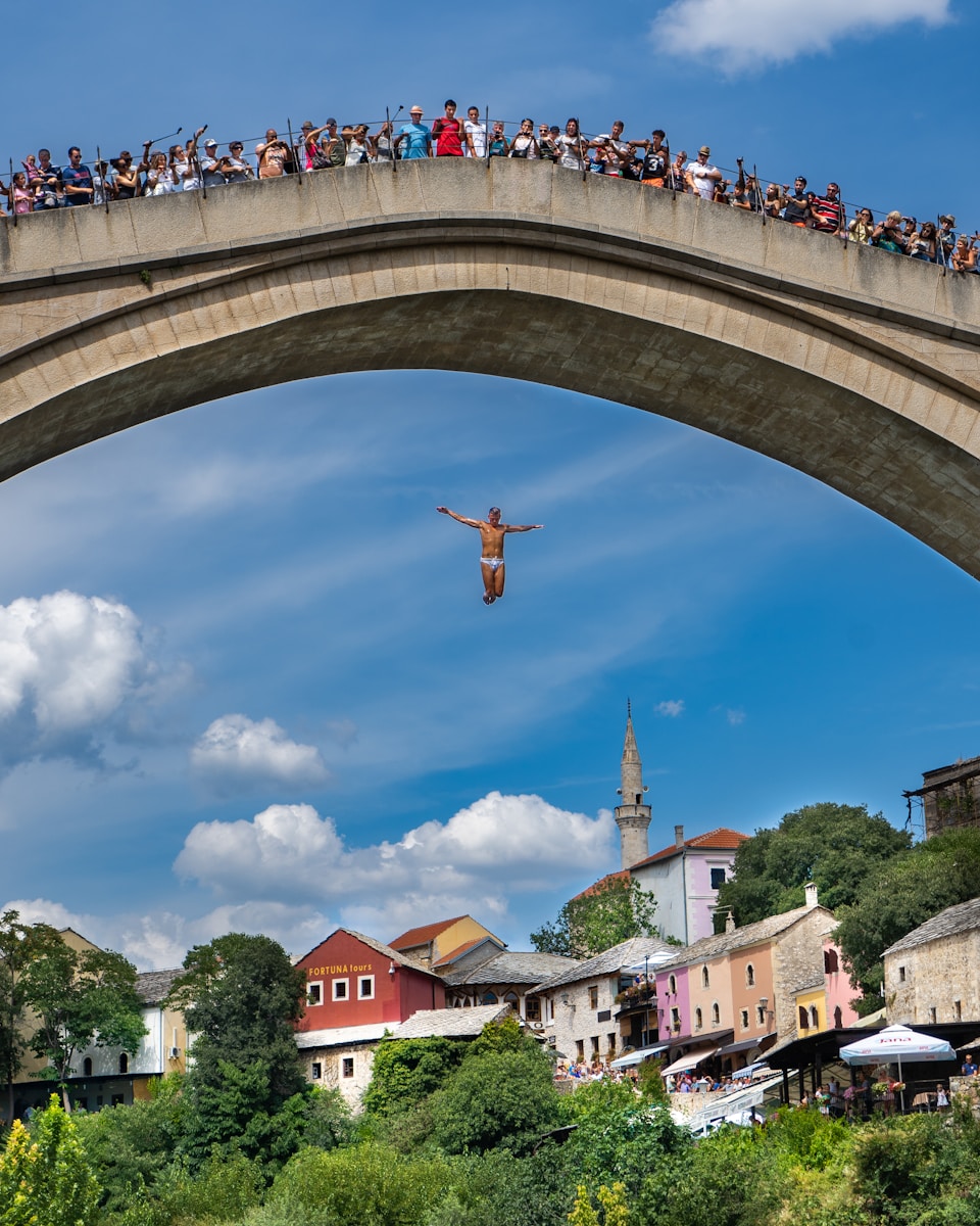 people on bridge at daytime